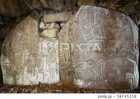 Shapes carved on a stone in one of the dolmens Mane Kerioned Shapes carved on a stone in one of the dolmens Mane Kerioned 58745158