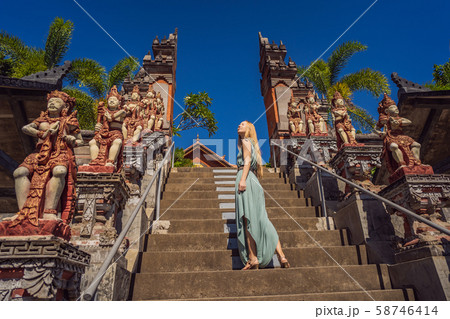 Young woman tourist in budhist temple Brahma Vihara Arama Bali Young woman tourist in budhist temple Brahma Vihara Arama Bali 58746414