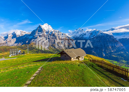 Grindelwald, Switzerland chalet and mountains view 58747005