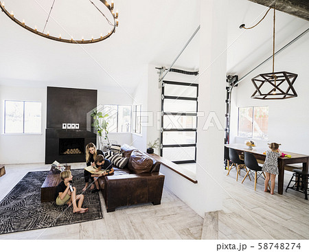 Family in open plan living and dining area Family in open plan living and dining area 58748274