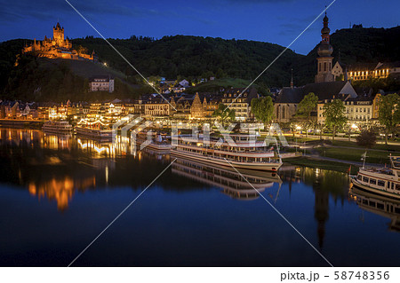 Town and Cochem Imperial Castle by river at sunset in Cochem, Germany 58748356