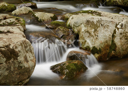 River flow over rocks River flow over rocks 58748860