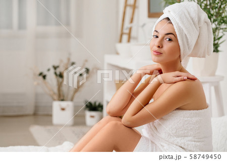 beautiful young woman with bath towel beautiful young woman with bath towel 58749450