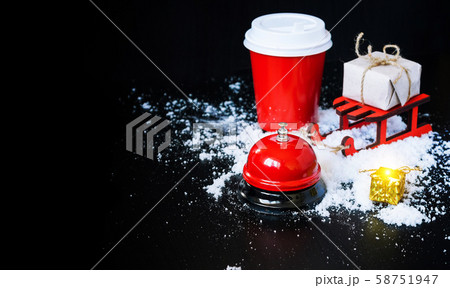 Coffee to go in red cup, sledge, bell call and 58751947