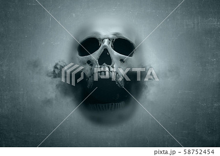 Human skull with dark smoke from his mouth behind 58752454