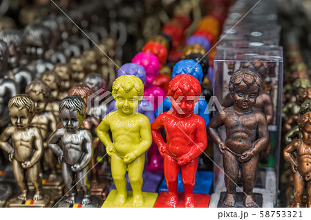 Pissing Boy (Manneken Pis) toys in souvenir shop - 58753321