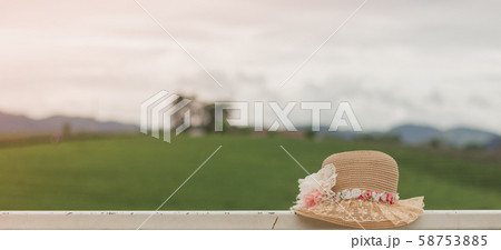 Beautiful hat with flower on the rail and natural Beautiful hat with flower on the rail and natural 58753885