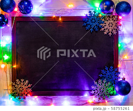 Christmas background with Christmas decorations and garland. 58755261