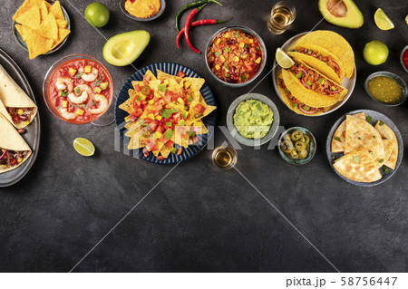 Mexican food, many dishes of the cuisine of Mexico, flat lay, shot from the top on a black Mexican food, many dishes of the cuisine of Mexico, flat lay, shot from the top on a black 58756447