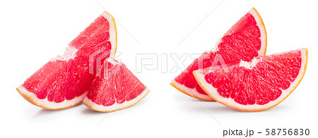 Grapefruit slice isolated on white background close up Grapefruit slice isolated on white background close up 58756830