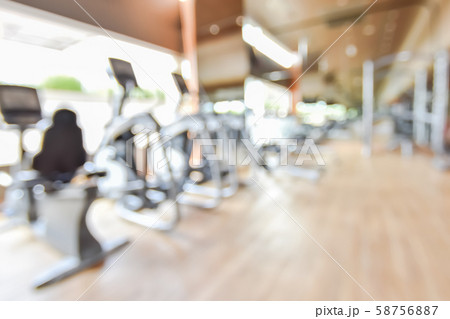 Blur gym background fitness center or health club with blurry sports exercise equipment for aerobic workout and bodybuilding 58756887