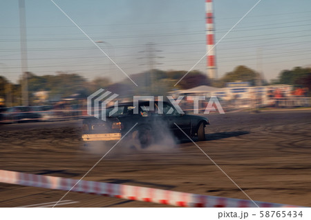 Car drifting, Blurred of image diffusion race drift car Car drifting, Blurred of image diffusion race drift car 58765434