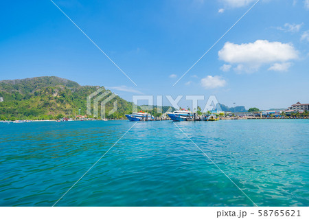 Boats in Phi Phi, Maya beach with blue turquoise Boats in Phi Phi, Maya beach with blue turquoise 58765621