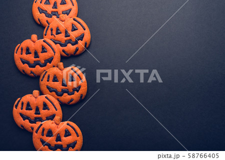 Dark background with halloween pumpkins. Dark background with halloween pumpkins. 58766405
