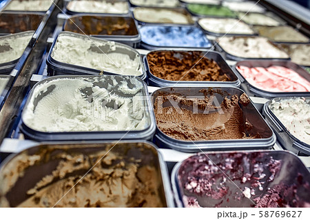 Ice cream showcase with lots of different sorts of ice cream. Ice cream showcase with lots of different sorts of ice cream. 58769627