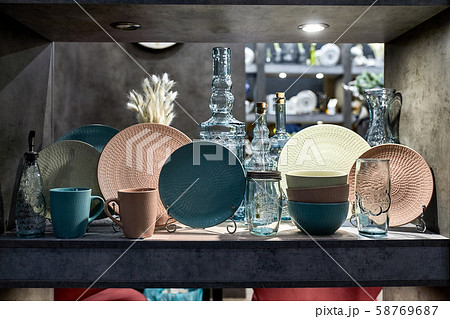 a showcase with the laying of porcelain dishes. Beautiful merchandising, dishes for restaurants and 58769687