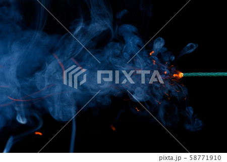 Burning fuse. Dynamite firecracker green fuseの写真素材 [58771910] - PIXTA