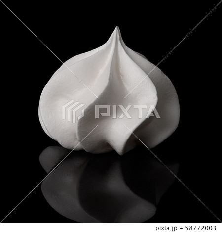 Meringue cookie isolated on black background with reflection. White merengue twisted bisquit. 58772003