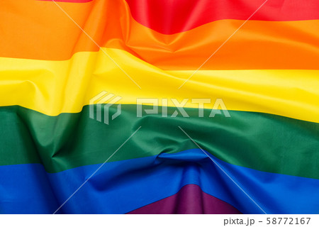 Pride LGBT gay rainbow flag top view flat lay abstract background with copy space Pride LGBT gay rainbow flag top view flat lay abstract background with copy space 58772167
