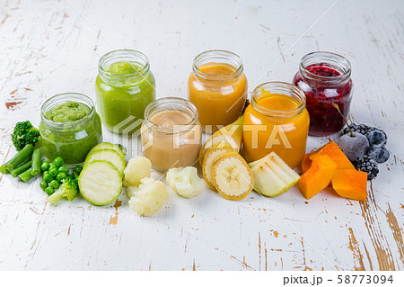 Colorful baby food purees in glass jars Colorful baby food purees in glass jars 58773094