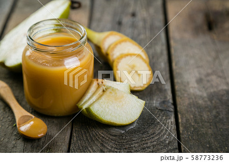 Colorful baby food purees in glass jars 58773236