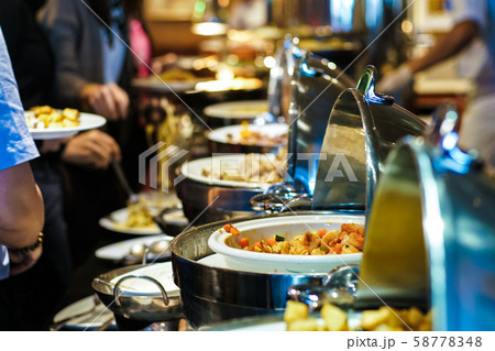 Lunch food buffet catering party with hand of Lunch food buffet catering party with hand of 58778348