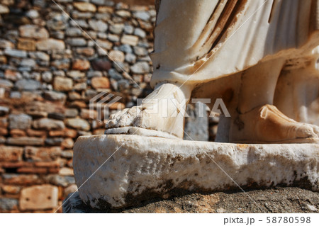 Elements of marble legs of an ancient statue of 58780598