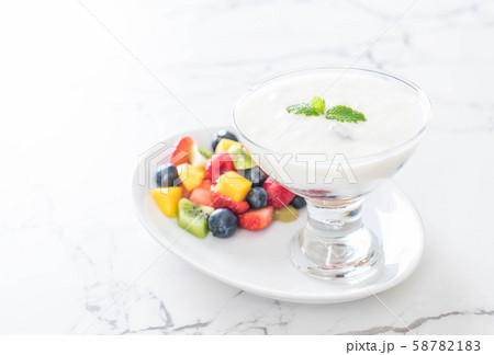 yogurt with mixed fruit (strawberry, blueberries, 58782183