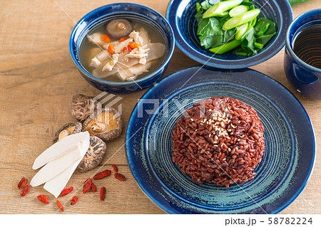 chicken and herb soup, chinese kale with berry 58782224