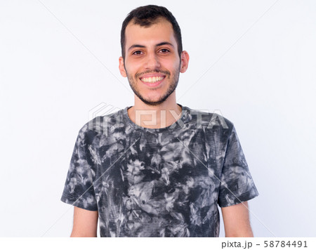 Face of happy young bearded Persian man smiling Face of happy young bearded Persian man smiling 58784491