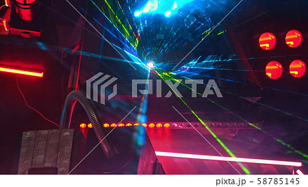 There are a lot of bright lasers in the room 58785145