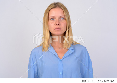 Face of young beautiful woman with blond hair 58789392