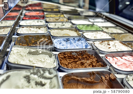 Ice cream showcase with lots of different sorts of ice cream. Ice cream showcase with lots of different sorts of ice cream. 58790080