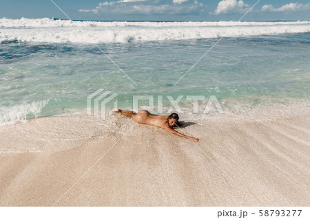 young naked on beach 123RF