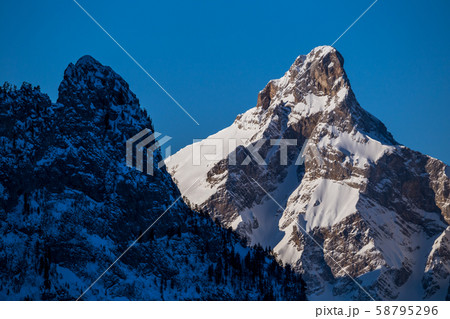 Mountain peaks in the shade and sunlit Mountain peaks in the shade and sunlit 58795296