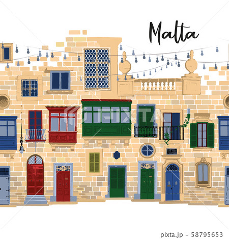 Traditional maltese houses made of sandy stone bricks with various doors, windows and balconies. 58795653