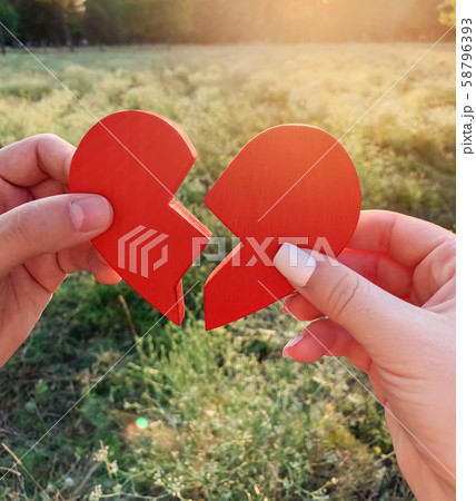 Loving couple joins together the halves Loving couple joins together the halves 58796393
