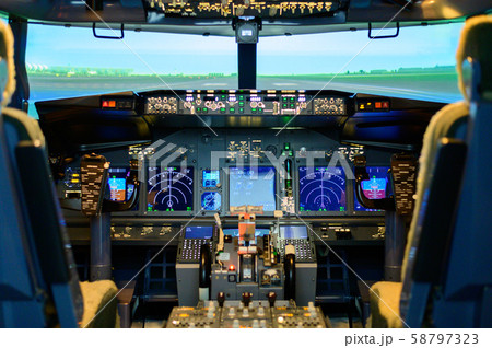 Inside flight simulator cockpit training Inside flight simulator cockpit training 58797323