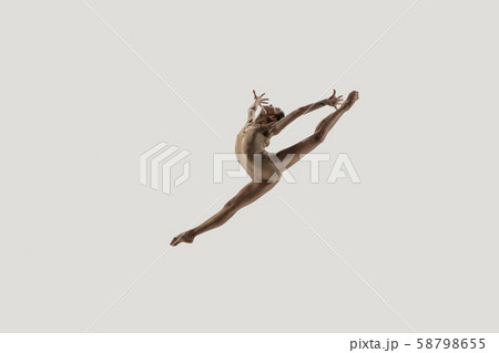 Modern ballet dancer. Contemporary art ballet. Young flexible athletic woman. Modern ballet dancer. Contemporary art ballet. Young flexible athletic woman. 58798655