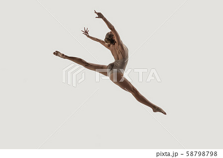 Modern ballet dancer. Contemporary art ballet. Young flexible athletic woman. Modern ballet dancer. Contemporary art ballet. Young flexible athletic woman. 58798798