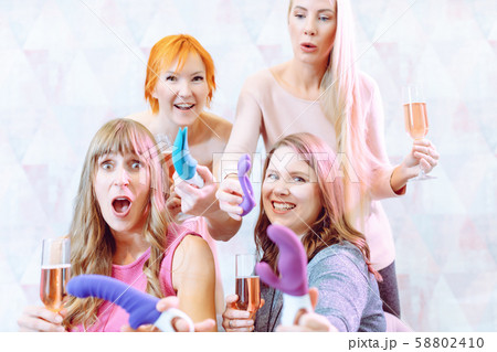 Women showing sex toys they bought at a dildo party 58802410