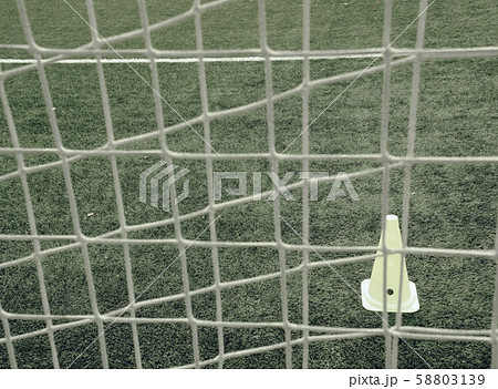 Close-up of soccer turf within kids training. Close-up of soccer turf within kids training. 58803139