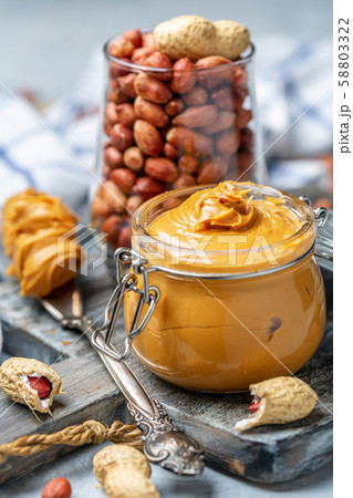 Jar with creamy peanut butter. 58803322