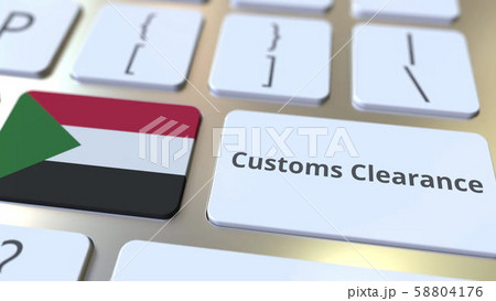CUSTOMS CLEARANCE text and flag of Sudan on the computer keyboard. Import or export related CUSTOMS CLEARANCE text and flag of Sudan on the computer keyboard. Import or export related 58804176