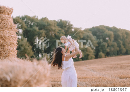 mother small daughter white dresses field straw mother small daughter white dresses field straw 58805347