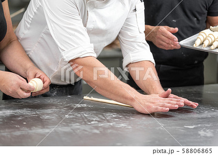 Baker concept. Make croissant on table , fresh bakery. Baker concept. Make croissant on table , fresh bakery. 58806865