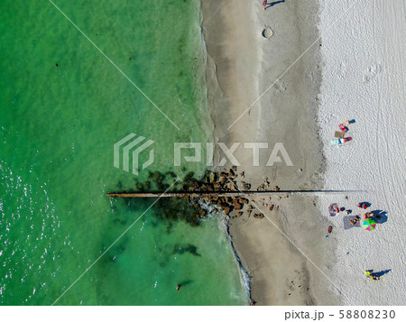 Aerial top view Cortez beach and little rocks pier 58808230