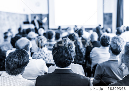 Business speaker giving a talk at business conference event. Business speaker giving a talk at business conference event. 58809368