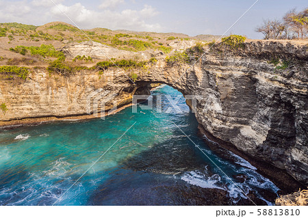 Landscape over Broken Beach in Nusa Penida, Indonesia Angel's BillaBong Beach. Popular tourist Landscape over Broken Beach in Nusa Penida, Indonesia Angel's BillaBong Beach. Popular tourist 58813810