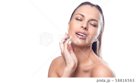 Portrait of a woman touching face. Isolated on white background Portrait of a woman touching face. Isolated on white background 58816563